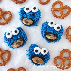 cookies and pretzels made to look like cookie monster faces with googly eyes