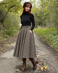 We listened to your ideas for the perfect winter skirt, and that’s how the Aurora skirt came to be! It’s designed for chilly days, with a fabric that keeps you warm, pockets to keep your hands toasty, and an elastic waistband that makes it easy to tuck in your favorite sweater. Now all that’s left is to take a stroll through the beautiful autumn or winter nature in your new skirt! 🍂🍄 Turtle Neck And Skirt Outfit, Plaid Skirt Outfit Winter, Maxi Skirt Winter Outfit, Long Skirt Winter Outfit, Long Skirt Outfits For Winter, Winter Long Skirt Outfit, Skirt Outfits For Winter, Skirt And Sweater Outfit