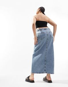 ASOS DESIGN Curve denim midi skirt with split hem in midwash | ASOS Denim Blue Midi Skirt With Pockets, Medium Wash Midi Skirt With Pockets, Dark Wash Midi Skirt With Pockets, Trendy Midi Bottoms With Pockets, High Rise Dark Wash Maxi Skirt With Pockets, High Rise Denim Maxi Skirt With Pockets, Denim Maxi Skirt With Pockets In Medium Wash, Spring Bottoms With Pockets And Split Hem, High Rise Denim Blue Maxi Skirt With Pockets