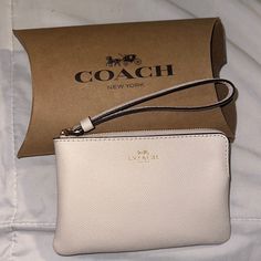 - Brand New - Not Used - Comes In Packaging Coach Everyday Bags With Wrist Strap, Everyday Coach Bags With Wrist Strap, Chic Everyday Wristlet With Zipper Pouch, Coach Rectangular Everyday Wristlet, Coach Everyday Rectangular Wristlet, Chic Coach Wristlet For Daily Use, Chic Everyday Pouch Wristlet, Trendy Everyday Coach Clutch, Chic Coach Wristlet For Everyday Use