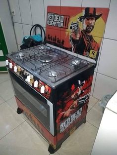 a red dead kitchen stove with an advertisement on it