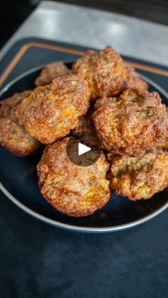 some fried food is on a plate and ready to be eaten by the person in the photo