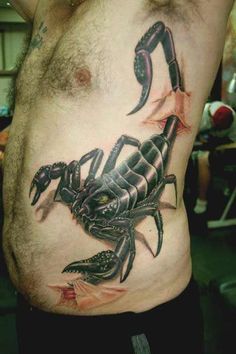 a man with a tattoo on his chest has a large black scorpion tattooed on it