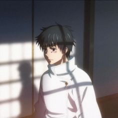 an anime character standing in front of a window