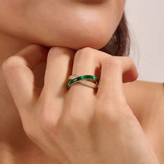 Introducing our Green Enamel X Ring, a bold and modern expression of style. This sleek piece features a bold X-shaped design complemented by a striking green enamel accent that adds a pop of color to the chic simplicity of the design. Whether worn as a standalone statement or stacked with other favorites, it is a symbol of understated style and a must-have addition for those who appreciate bold, yet refined style. - Made in 14k solid gold - Decorated with handset white cubic zirconia stone - Fin Elegant Green Enamel Ring, Elegant Green Enamel Ring As A Gift, Elegant Green Enamel Ring For Gift, Elegant Green Enamel Ring Gift, Modern Green Enamel Jewelry, Green Enamel Ring, X Ring, Understated Style, Full Eternity Ring