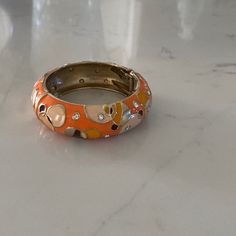 About 3/4” Wide. Like New Bracelet. Never Worn. Orange With Cream, Brown And Tangerine Accents And Rhinestones. Sunset Jewelry, Brand Bracelet, New Bracelet, Brand Jewelry, Inspired Outfits, Cosplay Outfits, Jewelry Branding, Color Orange, Womens Jewelry Bracelets