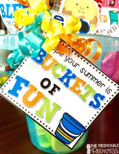 a sign that says buckets of fun in front of some other items on the table