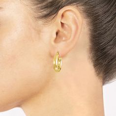 These 14K gold over brass hoop earrings add a simple and bold statement to any jewelry collection. Hoop earrings are crafted in 14K gold over brass, 25.6mm in length and have a hinged closure. With the simple hoop design, these hoop earrings will become a staple in your jewelry collection. With the simple and sleek design, these hoop earrings can be worn with your everyday wardrobe choices. Wipe hoop earrings clean with a soft cloth.Included: 1 Pair of EarringsFeatures: Nickel FreeEarring Back: Modern Gold Huggie Wrap Earrings, Modern Gold Huggie Earrings With Lever Back, Minimalist Cadmium-free Hoop Earrings, Brass Hoop Earrings, Brass Hoops, Hoop Design, Earrings Hoop, Everyday Wardrobe, Sleek Design