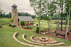 an aerial view of a stone garden with a gazebo in the middle and steps leading up to it