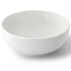 a white bowl sitting on top of a table