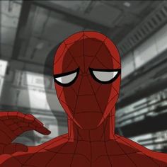 spider - man pointing at something in the distance