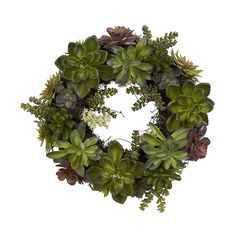 a wreath with succulents and other plants on it is displayed against a white background