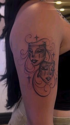 a woman with a tattoo on her shoulder