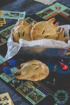 two pies sitting on top of a table next to each other