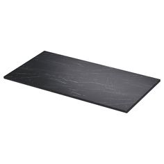 a black marble cutting board on a white background