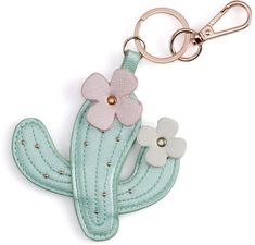 a cactus keychain with two flowers on it's front and back ends