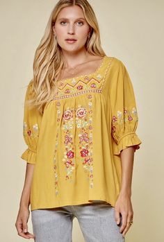 Add a little sunshine into your day! Mary Marigold Embroidered Blouse Cute embroidery top featuring square shaped neckline and half sleeves. Babydoll bodice with beautiful embroidery all over. Woven & Non Sheer Rayon Embroidered Tunic Dress, Casual Tunics, Embroidery Top, Cute Embroidery, Unique Boutique, Embroidered Tunic, Beautiful Embroidery, Embroidered Blouse