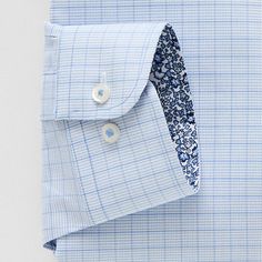 Featuring a grid pattern, this Stafford men's button-down shirt effortlessly elevates your office or going out look. Cut in a regular-fit, it's made from stretch-cotton poplin with a point collar, long sleeves, and button cuffs. Wear it with tailored pants and oxford shoes.Closure Type: ButtonFit: Regular FitPockets: 1 Chest Slip PocketSleeve Length: Long SleeveFiber Content: 96% Cotton, 4% SpandexFabric Description: DobbyCollar: Point CollarCare: Machine WashOwned & Founded: Women Owned/Founde… Fitted Shirt With Welt Pockets For Business, Fitted Dress Shirt For Business, Plaid Cotton Shirt For Office, Smart Blue Shirt For Office Wear, Business Dress Shirt With Welt Pockets, Spring Business Dress Shirt With Placket, Plaid Shirt With Placket For Workwear, Fitted Blue Shirt With Welt Pockets, Plaid Spread Collar Shirt For Business Casual