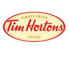 the logo for tim horton's coffee is shown in red and white letters on a light yellow background