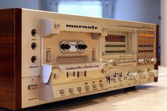 an old radio sitting on top of a table