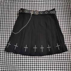 Introducing our latest fashion statement: the Black and White Skirt for Women with a Cross Punk Aesthetic. This edgy and versatile skirt is perfect for those who embrace the punk, goth, Addamcore, or Opiumcore aesthetics. Made from high-quality polyester material, this skirt is designed to turn heads wherever you go. Free shipping in the US and worldwide. Size Chart: S - Waist: 64 cm (25.2 in); Hips: 86 cm (33.9 in); Length: 37 cm (14.6 in) M - Waist: 68 cm (26.8 in); Hips: 90 cm (35.4 in); Length: 37 cm (14.6 in) L - Waist: 72 cm (28.3 in); Hips: 94 cm (37 in); Length: 38 cm (15 in) XL - Waist: 76 cm (29.9 in); Hips: 98 cm (38.6 in); Length: 38 cm (15 in) 2XL - Waist: 80 cm (31.5 in); Hips: 102 cm (40.2 in); Length: 39 cm (15.4 in) Unique black and white design for a bold and striking loo Punk Aesthetic Black, Black And White Skirt, Punk Aesthetic, Skirt For Women, Aesthetic Black, Punk Goth, White Skirt, A Cross, Black And White Design