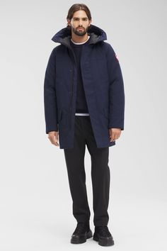 The Langford gets an update with streamlined hood adjustment, additional drop-in pockets, and added backpack straps. This stylish urban piece is similar to the Chateau parka but is slightly longer for greater leg protection. With a storm flap over the centre front zipper and two interior pockets, Langford offers clean lines and a modern look - all in an uncompromisingly protective parka. Customize your parka and extend the coverage of your hood with a variety of our interchangeable Hood Trim acc Canada Goose Parka, Men Parka, The Chateau, Baby Outerwear, Mens Parka, Great Legs, Snow Pants, A Storm, Backpack Straps