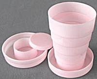 pink plastic cups are stacked on top of each other, with the words do you remember?