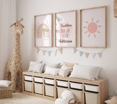 a child's room decorated in neutrals and pastels with giraffe art