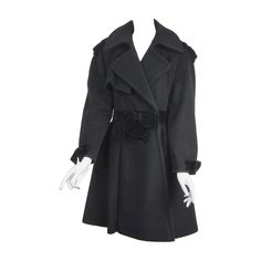 Stunning Black Wool and Velvet Moschino Coat. Double Breasted. Bow trims Collar, Cuffs and Belt Measuring 36 in Bust / 30 in Waist / 37 in Length / 23 in Sleeves. Button was replaced on the jacket, original button is in the pocket. Please be sure to check our storefront for more fashion as we have both Vintage and Contemporary fashions. This is ready to wear! We also have hundreds of pieces of jewelry from New Old Stock (never worn) as well as fine jewelry, southwestern and sterling. We have bee Denim Biker Jacket, Moschino Couture, Designer Coats, Black Wool Coat, Moschino Cheap And Chic, Military Coat, Coat Design, Moda Vintage, Outerwear Coats