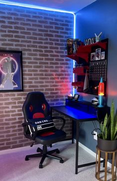 a room with a brick wall and blue lighting in the corner, there is a chair next to a desk