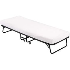 a white mattress sitting on top of a metal frame