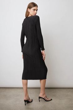 Wear with your favorite heels or slip-ons, this dress with be your go-to staple Black Dress Elegant, Classic Little Black Dress, Plisse Fabric, Statement Coat, Model Dress, Black Media, Slip Ons, Simple Dresses, Elegant Dresses