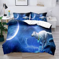 a bed with two wolfs on it and the moon in the sky