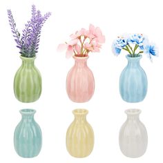 four different colored vases with flowers in them