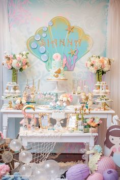 an image of a birthday party with flowers and cake