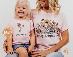 "Mommy and Me Shirts - Raising Wild Flower Retro Shirts - Mother's Day Shirts #6170 THIS ITEM IS NOT SOLD AS A SET. PLEASE ADD TO CART EACH SHIRT THAT YOU WANT, THEN CHECKOUT All of the shirts and bodysuits at our shop are CPSIA compliant. We only use Eco-friendly, water-based inks that are also CPSIA compliant and boasts strong washability (highest score on AATCC wash test).  So rest assure to put them on your little ones!  ** COLOR OF T-SHIRTS WILL VARY SLIGHTLY DUE TO LIGHTING AND/OR MONITOR Mommy And Me Shirts, Flower Retro, Mommy And Me Shirt, Mother And Daughter, Mom Sweatshirt, Mothers Day Shirts, Wild Flower, Toddler Tees, Retro Shirts