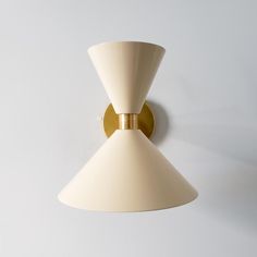 Cream and brass midcentury modern inspired cone wall sconce Female Bedroom, Credenza Decor, Long Hall, Sazerac, Deco Luminaire, Mid Century Modern Interiors, Hour Glass, Brass Band, How To Clean Metal