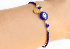 "This evil eye bracelet is made with navy blue evil eye and seed beads, navy blue gemstones, little pearls and, Ottoman Sultan's signature coin charms. This navy blue bracelet is 6.7\" (17 cm.) long. If you need other special size, please tell me. I will adjust length. Please visit my store to see the other handmade and evil eye jewelry https://www.etsy.com/shop/asteriascollection" Evil Eye Bracelet Diy, Evil Eye Jewelry Bracelet, Gift For Friends Birthday, Blue Evil Eye Bracelet, Christmas Gift For Friends, Jewelry Accessories Ideas, Feather Jewelry, Summer Bracelets, Blue Evil Eye