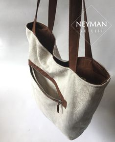 This beige thick canvas furniture textile bag is highly durable and comfortable for every day use. Its simple design makes it perfect for any and every occasion like work, shopping, beach, going out etc. The bag is really very roomy, so you can use it as travel bag as well. The combination of beige canvas and brown vegan suede leather elements gives the bag a unique look. The wide handles comfortably fit your shoulders. It has a big side pocket with zipper. The medium inner pocket is perfect for Large Capacity Cream Canvas Shoulder Bag, Neutral Rectangular Canvas Bag For Everyday Use, Rectangular Neutral Canvas Bag For Everyday Use, Everyday Use Neutral Rectangular Canvas Bag, Eco-friendly Cream Canvas Bag For Everyday Use, White Canvas Tote Shoulder Bag, Modern Beige Canvas Bag With Large Capacity, Modern Large Capacity Beige Canvas Bag, Everyday Use Neutral Canvas Bag