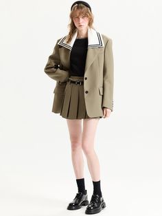 This oversized jacket features minimalistic silhouette with notched lapels and button fastenings. It is accentuated with wide, detachable knit sailor collar panel.  - Intended for a loose fit- Voluminous padded shoulders- Cute sailor collar with striped pattern - Single button fastenings and buttoned cuffs- Casual flap pockets Khaki Pea Coat With Lapel Collar For Work, Khaki Collared Blazer For Work, Chic Outerwear With Contrast Collar For Work, Oversized Khaki Blazer For Workwear, Sailor Cardigan, Sailor Collar, Oversized Jacket, Jacket Style, Flap Pocket