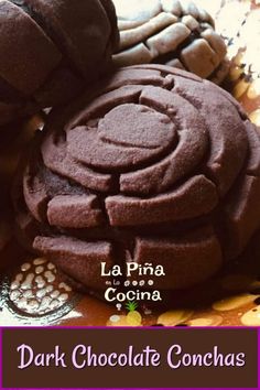 chocolate cookies are stacked on top of each other with the words dark chocolate conchas