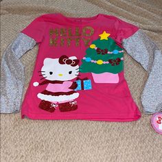 Hello Kitty Christmas Shirt Brand New With Tag Cute Long Sleeve T-shirt For Holiday, Cute Long Sleeve Holiday T-shirt, Cute Long Sleeve Tops For Festive Occasions, Hello Kitty Shirts, Hello Kitty Hoodie, Hello Kitty Sweatshirt, Hello Kitty Dress, Kitty Christmas, Disney Toddler