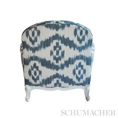 an upholstered blue and white patterned couch