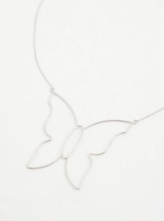 A butterfly-shaped charm shimmers on a silver chain to give this delicate necklace an eye-catching look. Lobster clasp. 19” length and 5” extender. Man-made materials. Imported. The best plus size women's silver-tone butterfly wire necklace necklaces in silver. Torrid is your destination for the freshest spring and summer styles. Silver Butterfly Necklace With Butterfly Clasp, Delicate Silver Butterfly Necklace With Clavicle Chain, Sterling Silver Butterfly Necklace With Clavicle Chain, Dainty Silver Butterfly Necklace For Party, Minimalist Silver Butterfly Jewelry, Silver Butterfly Necklace With Clavicle Chain, Adjustable Silver Butterfly Necklace With Clavicle Chain, Silver Butterfly Necklace With Adjustable Clavicle Chain, Silver Sterling Butterfly Necklace With Clavicle Chain