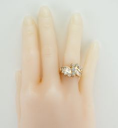 Genuine Diamond Ring, Large Diamonds, Vintage Ring, Gold Ring, Gold Band, Natural Diamond Cluster Ring, April Birthstone, Estate Ring, This stunning elegant ring is crafted in solid 14K Yellow Gold. Nine round brilliant cut diamonds total 1.45 carats of VS2 to SI2 clarity and H color. Sixteen channel set diamonds total .40 carat of SI2-I1 clarity and H color. The top of the ring measures 16mm North-South. Size 6 (can be resized). The ring weighs 7.7 grams. Great vintage condition. 05883287* Estate Style Diamond Ring For Formal Occasions, Estate Style Formal Diamond Ring, Estate Style Diamond Rings With Accents, Estate Wedding Rings With Diamond Accents, Estate Diamond Ring With Diamond Cut, Estate Style Diamond Jewelry With Brilliant Cut, Estate Diamond Rings With Prong Setting, Estate Style Diamond Ring As Gift, Estate Style Diamond Ring With Diamond Cut