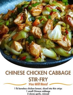 chinese chicken cabbage stir fry in a black bowl on a blue towel with the title above it