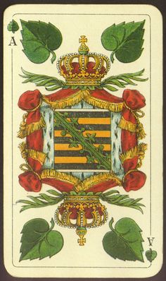 a playing card with the coat of arms and two roses on it, surrounded by green leaves