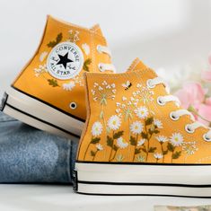 Welcome to LunnNest, a hand embroidered items shop. These are the most meticulously embroidered shoes that I give to you. I embroider them carefully and thoroughly with skillful hands. Converse type: Converse High Tops Chuck Taylor 1970s Converse color:  13. 1970s_Yellow Price includes: Shoes + Embroidery as Pictured I can buy it for you at a store near your home or you can send me the canvas shoes you have available. Your embroidered Converse, Vans shoes are ready to ship in 8-16 days. I need t Converse Types, Cute Converse Shoes, Shoes Embroidery, Yellow Converse, Embroidered Converse, Cute Converse, Embroidered Items, Flowers Daisy, Custom Converse