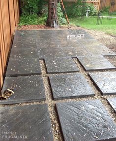 an outdoor patio that has been laid out and ready to be used as a planter