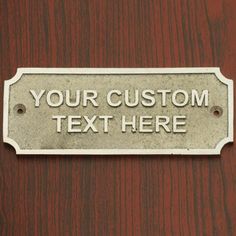 a metal sign that says, your custom text here